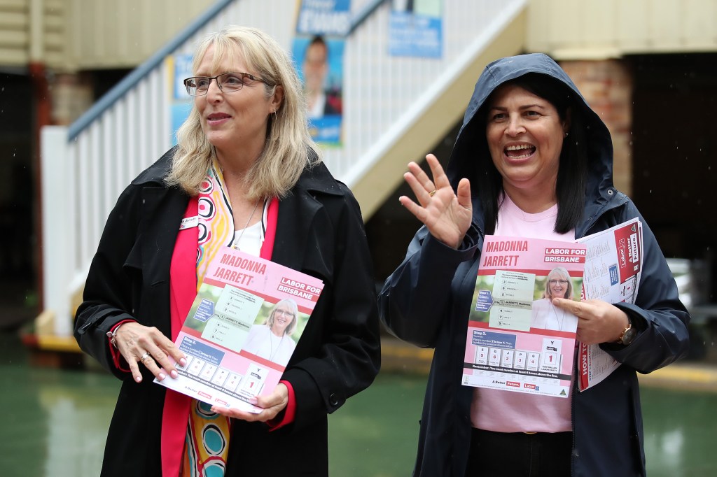 Madonna Jarrett and Grace Grace are seen on Federal Election day, in the seat of Brisbane in Brisbane, Saturday, May 21, 2022. More than 17 million Australians will vote to elect the next federal government. (AAP Image/Jono Searle) NO ARCHIVING