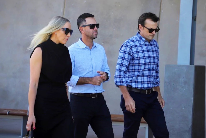 Ricky Ponting and Adam Gilchrist arrive for the memorial at Townsville's Riverway stadium. (Image: ABC North Queensland)