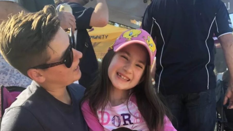 Elizabeth Struhs with her older sister, Jayde, who has claimed the parents were members of a "fear-driven religious cult". (Image: GoFundMe/ABC)