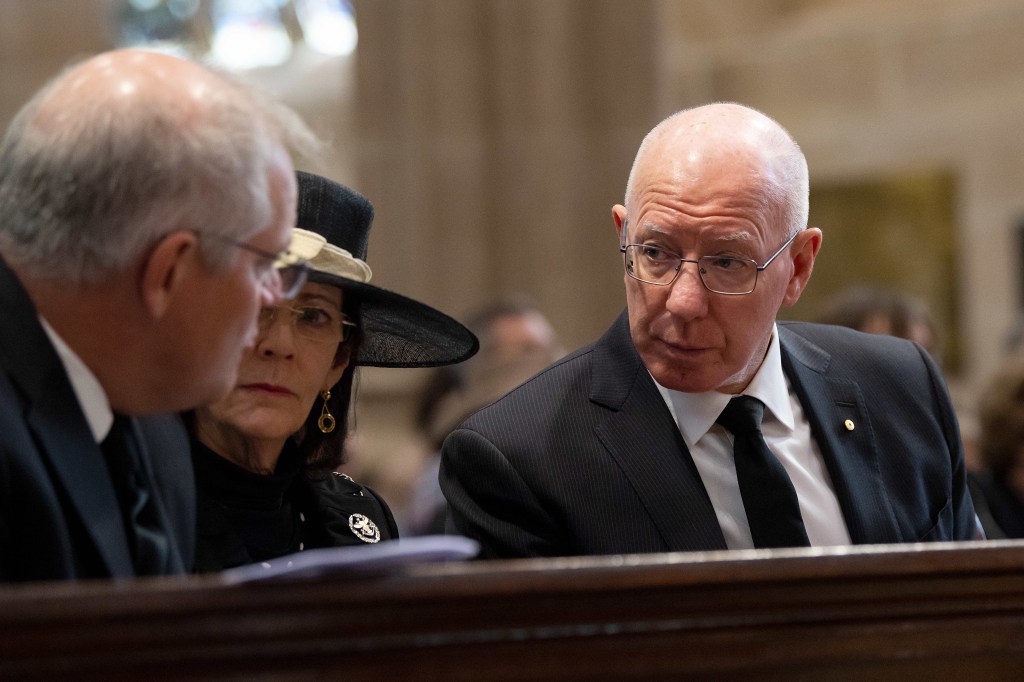 Governor-General David Hurley (right) speaking to Scott Morrison (left) at a special prayer service to commemorate the death of Prince Philip in April 11, 2021. (AAP Image/Pool, Bianca De Marchi)