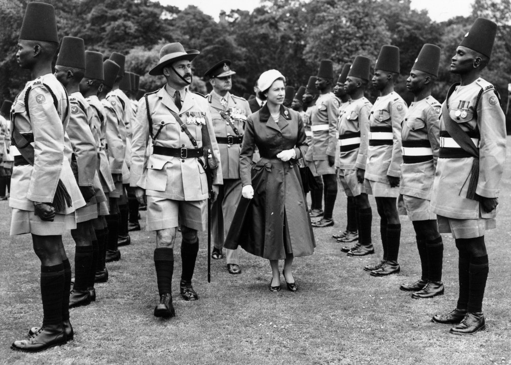 Queen Elizabeth II conducts an inspection of the Kings African Rifles Regiment in the courtyard of Buckingham Palace in London, Britain, 11 June 1957. An infantry regiment from British East Africa that has been in existence since 1902.  EPA/STR   