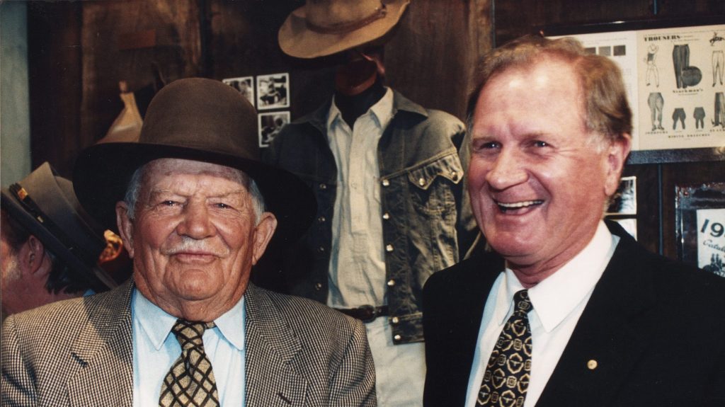 Ken Cowley (right) with RM Williams founder Reginald Murray Williams in 1996. (AAP Image/RM Williams)