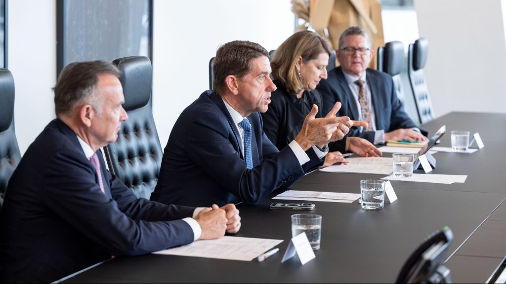 Treasurer Cameron Dick addressing the first meeting of the Queensland Finance Council at Gadens' boardroom in Eagle Street.