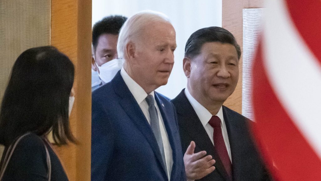 U.S. President Joe Biden, left, arrives with Chinese President Xi Jinping for a meeting on the sidelines of the G20 summit meeting in Bali, Indonesia. (AP Photo/Alex Brandon)