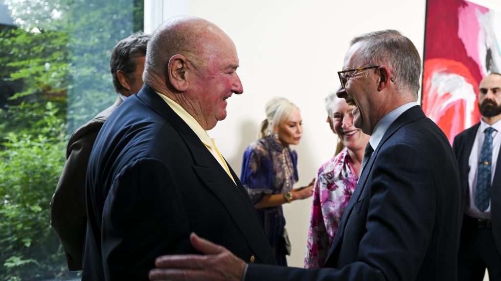 Austrlaian Prime Minister Anthony Albanese (right) speaks to Australian businessman Lindsay Fox as they attend the official opening of the exhibition of Aboriginal artist Mirdidingkingathi Juwarnda Sally Gabori at the Cartier Foundation in Parisn. (AAP Image/Lukas Coch) He is now under fire for attending a barbecue with the billionaire.