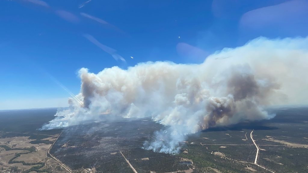 A supplied image shows a bushfire in Myall Park Tuesday. (AAP Image/Supplied by Queensland Fire and Emergency Services) 