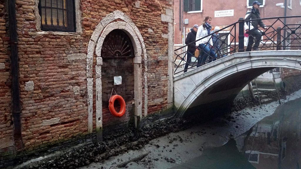 An internal canal during a low tide in Venice, Italy,this week. Venice has been struggling for many days with a low tide, which is beginning to create serious problems for navigability.  EPA/ANDREA MEROLA