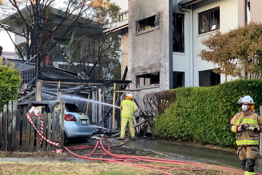 Emergency crews at the scene of the alleged arson where a Brisbane mother had to decide which of her children she should save first. (Image: ABC, Talissa Siganto)