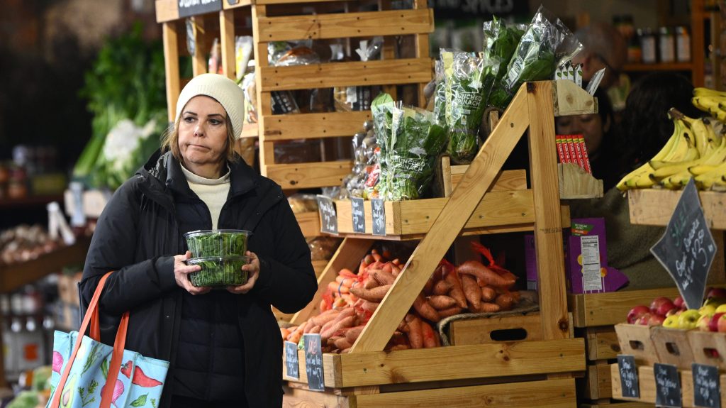 Members of the public shop for fresh produce.  (AAP Image/Joel Carrett)