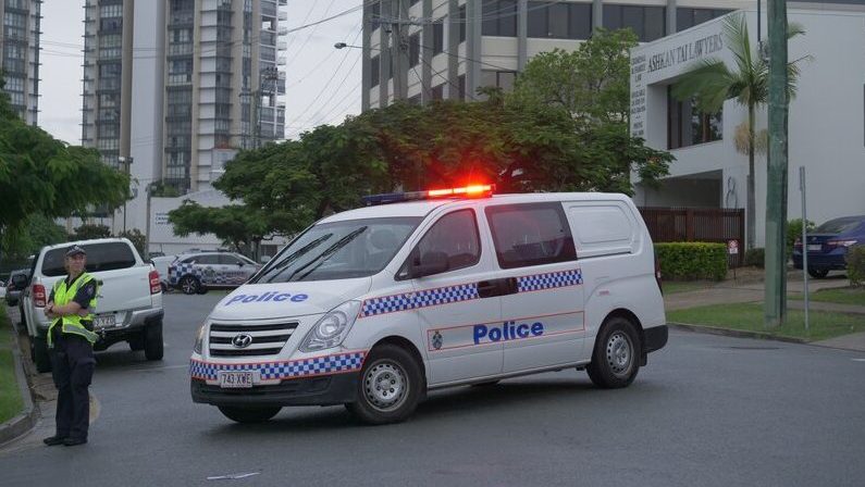 Police have launched a manhunt for a driver who fired a gun at another driver after a road range incident on the Gold Coast. (Image; ABC Dominic Consdale)