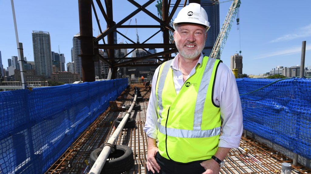 Queen's Wharf Project Director Simon Crooks is seen inspecting construction work on the Neville Bonner Bridge, just one of the major projects requiring drivers and pedestrians to keep their patience.. (AAP Image/Darren England) 