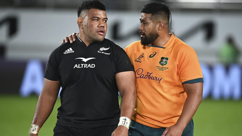 New Zealand's Samisoni Taukei'aho and Australia's Folau Fainga'a, right, chat following the Bledisloe Cup rugby test match between the All Blacks and the Wallabies at Eden Park in Auckland. (Andrew Cornaga/Photosport via AP)