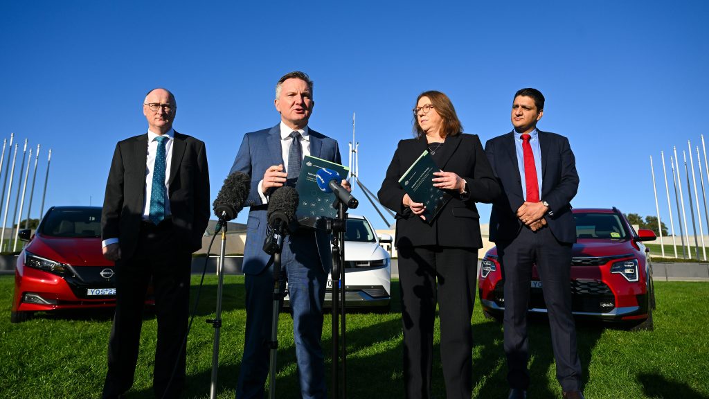 Australian Climate Change and Energy Minister Chris Bowen and Australian Transport Minister Catherine King launch the National Electric Vehicle Strategy at a press conference outside Parliament House in Canberra, Wednesday, April 19, 2023. (AAP Image/Lukas Coch)