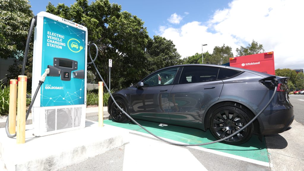 An electric vehicle charging station is seen at Bundall, on the Gold Coast. (AAP Image/Jason O'Brien)