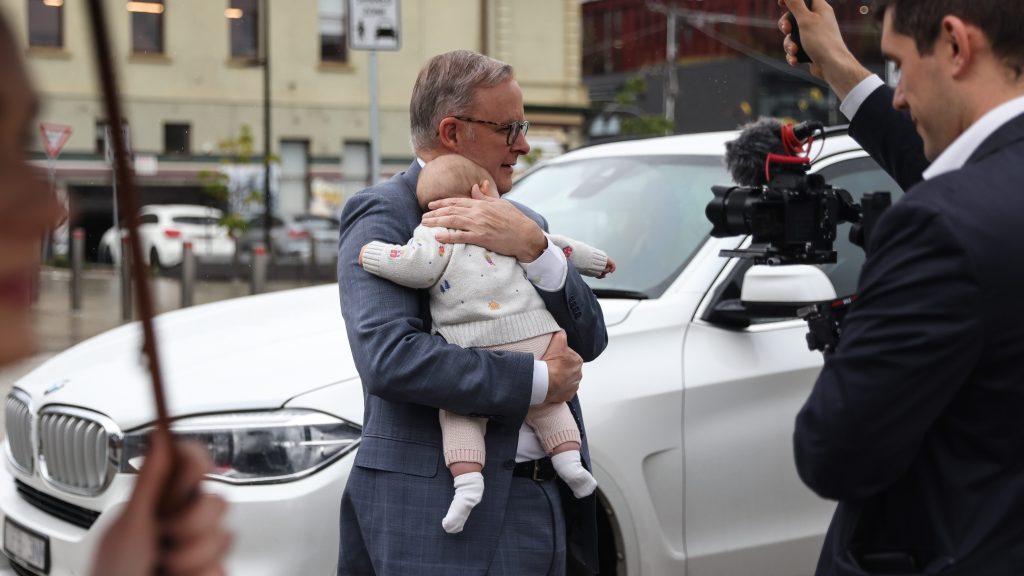 Australian Prime Minister Anthony Albanese holds Mimi, a six-month-old baby during a visit to Star Health Prahran, Melbourne. (AAP Image/Diego Fedele)
