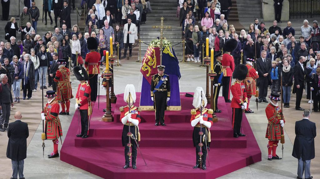 Members of the public file past as King Charles III, Princess Anne, Prince Andrew and Prince Edward hold a vigil beside the coffin of their mother, Queen Elizabeth II, as it lies in state (Yui Mok/Pool Photo via AP, File)