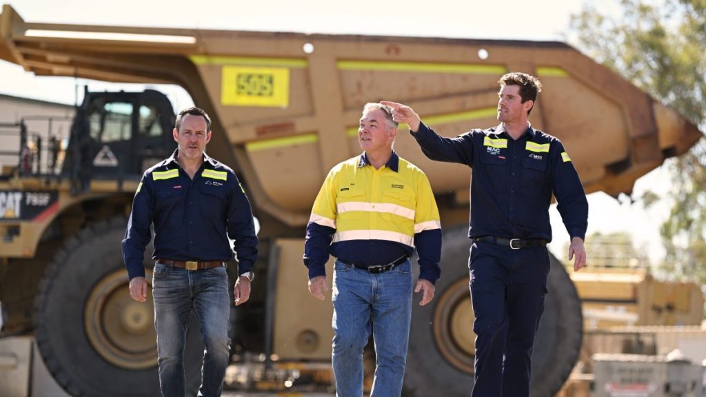 Queensland Resources Minister Scott Stewart (centre) and New Hope's Rob Bishop and Dave O'Dwyer at yesterday's Acland expansion opening (Pic New Hope)