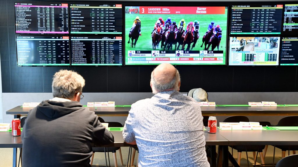 Despite a Covid-caused dip, Aussies are back to punting as much as they ever have. (AAP image)