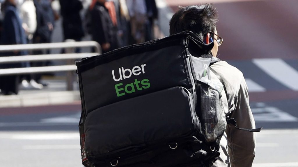 Uber will pay out almost $300m to cabbies whose business were crushed by the arrival of the rideshare player in Australia. (Kyodo via AP Images) ==Kyodo