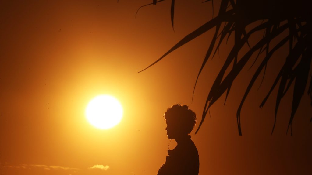 Sunrise at Coolangatta on the Gold Coast. (AAP Image/Jason O'Brien) 