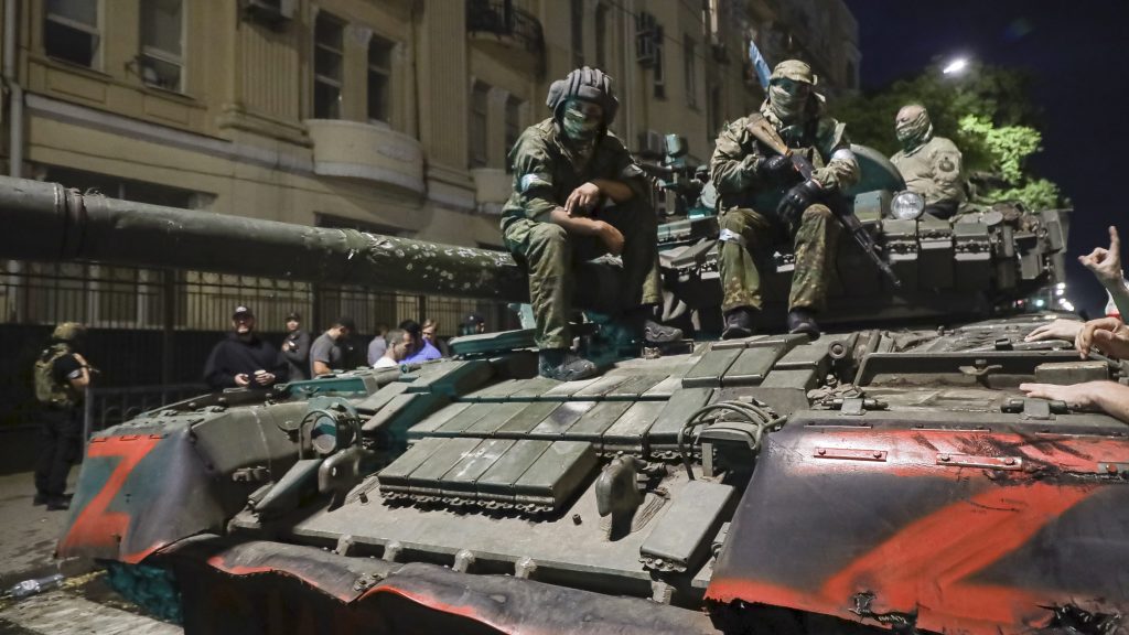 Members of the Wagner Group military company sit atop of a tank on a street in Rostov-on-Don, Russia, prior to leaving an area at the headquarters of the Southern Military District. (AP Photo, File)