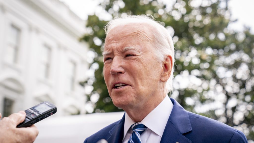 A strap-mark is visible on the face of President Joe Biden's. The President has started using a continuous positive airway pressure, or CPAP, machine at night to help with sleep apnea, the White House said Wednesday . (AP Photo/Andrew Harnik)