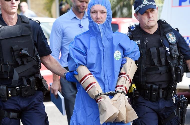 Jake Scott Ashman in the custody of police. (Image: Supplied)