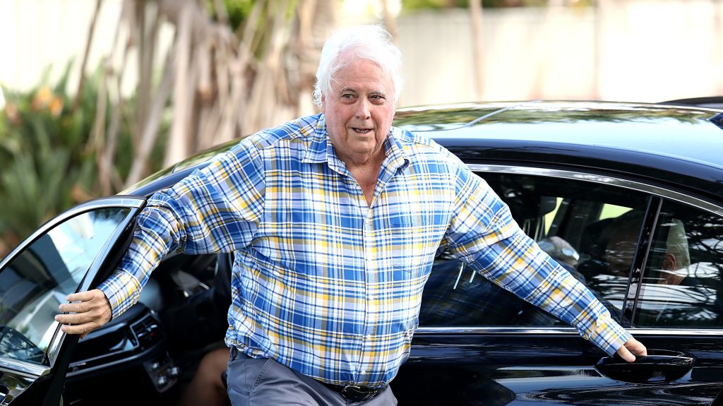 Clive Palmer arrives during an announcement, at Paradise Point on the Gold Coast. (AAP Image/Jason O'Brien) 