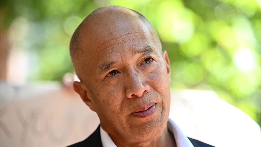 Neurosurgeon Charlie Teo speaks to media as he arrives at a Health Care Complaints Commission Professional Standards Committee inquiry, in Sydney, (AAP Image/Dan Himbrechts)