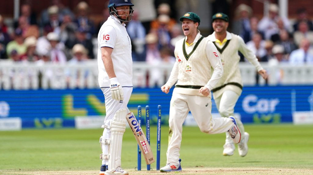 England's Jonny Bairstow (left) looks frustrated after being run out by Australia's Alex Carey (not pictured) as players celebrate during day five of the second Ashes test match at Lord's, London. Picture date: Sunday July 2, 2023.. See PA Story CRICKET England. Photo credit should read: Mike Egerton/PA Wire. RESTRICTIONS: Editorial use only. No commercial use without prior written consent of the ECB. Still image use only. No moving images to emulate broadcast. No removing or obscuring of sponsor logos.