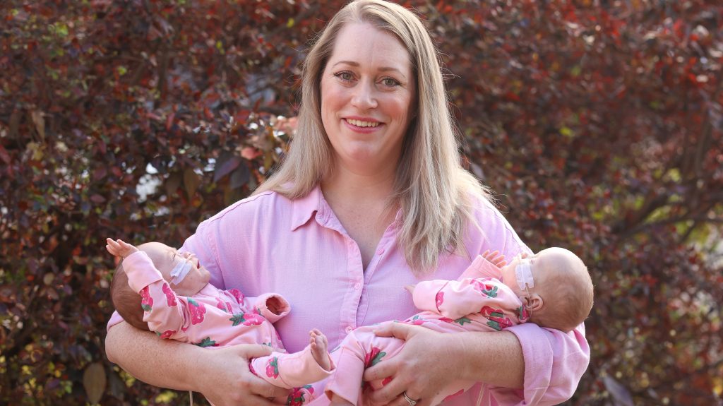 Gold Coast mum Jennifer Hockings with her premature twin girls Audrey and Adeline at Mater Mothers Hospital, Brisbane. Researchers are hopeful the successful trial of a one-shot vaccine will reduce hospitalisation rates for preterm babies (AAP Image/Supplied by Peter Wallis) 