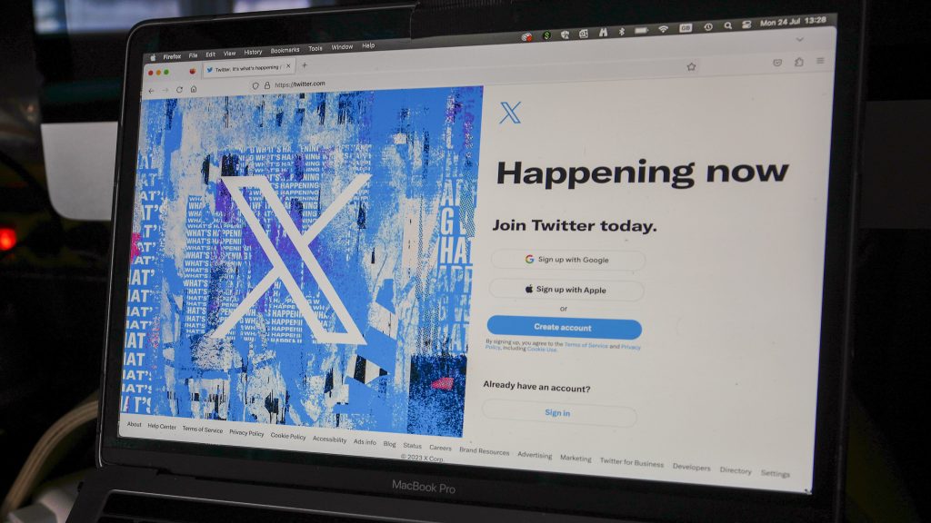 A view of a lap top showing the Twitter signing in page displaying the new logo. Elon Musk has unveiled a new black and white "X" logo to replace Twitter's famous blue bird as he follows through with a major rebranding of the social media platform he bought for $44 billion last year.(AP Photo/Darko Vojinovic)