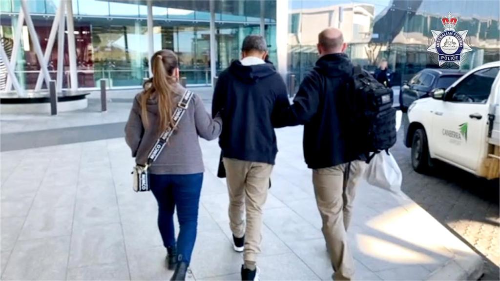 One of the accused leaves Townsville Court House. (Image: AFP supplied)