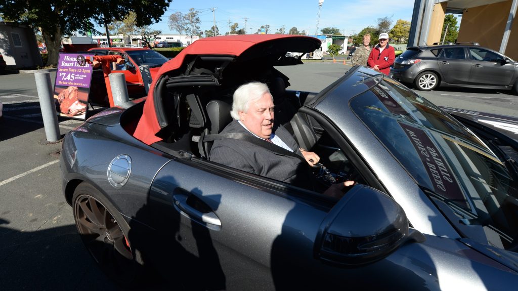 Former politician Clive Palmer would have to pay higher tolls when driving one of his expensive vehicles on the new toll-road model (AAP Image/Lukas Coch) 