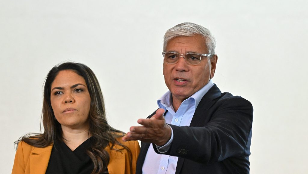 Country Liberal Party senator Jacinta Nampijinpa Price and Warren Mundine . (AAP Image/Mick Tsikas) 