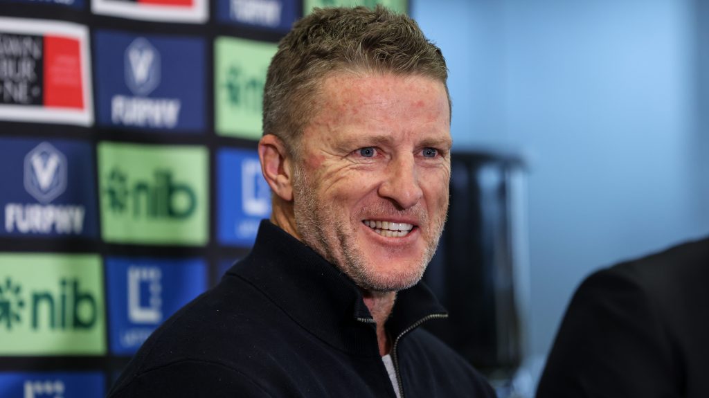 Former Richmond coach Damien Hardwick has signed up for six years as coach of the underperforming Gold Coast 
Suns (AAP Image/Diego Fedele) 