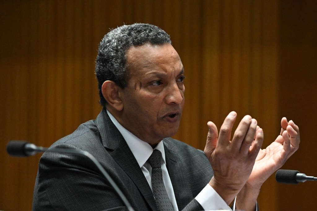 Qatar Airways Senior Vice President Aeropolitical and Corporate Affairs Fathi Atti speaks during the Select Committee on Commonwealth Bilateral Air Service Agreements at Parliament House in Canberra, Wednesday, September 27, 2023. (AAP Image/Lukas Coch) 