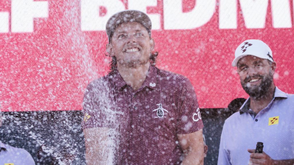 Golfers Cameron Smith (C) and Marc Leishman, all of Australia, spray  champagne to celebrate their team, Ripper GC, winning at the LIV Golf tournament at Trump National Golf Club.  EPA/JUSTIN LANE