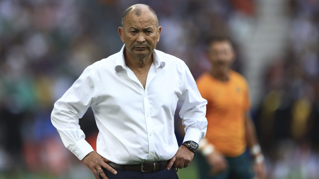 Australia's head coach Eddie Jones waits for the start of the fateful Rugby World Cup Pool C match between Australia and Fiji at the Stade Geoffroy Guichard in Saint-Etienne, France, Sunday, Sept. 17, 2023. (AP Photo/Aurelien Morissard)