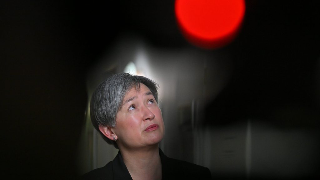 Minister for Foreign Affairs Penny Wong speaks to journalists in the press gallery at Parliament House in Canberra, Monday, October 16, 2023. (AAP Image/Mick Tsikas) 