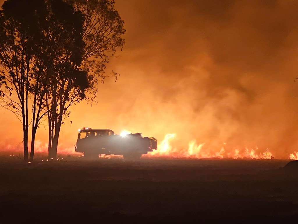 Thumbnail for ‘Wild beast’: One dead as hundreds flee Queensland blazes