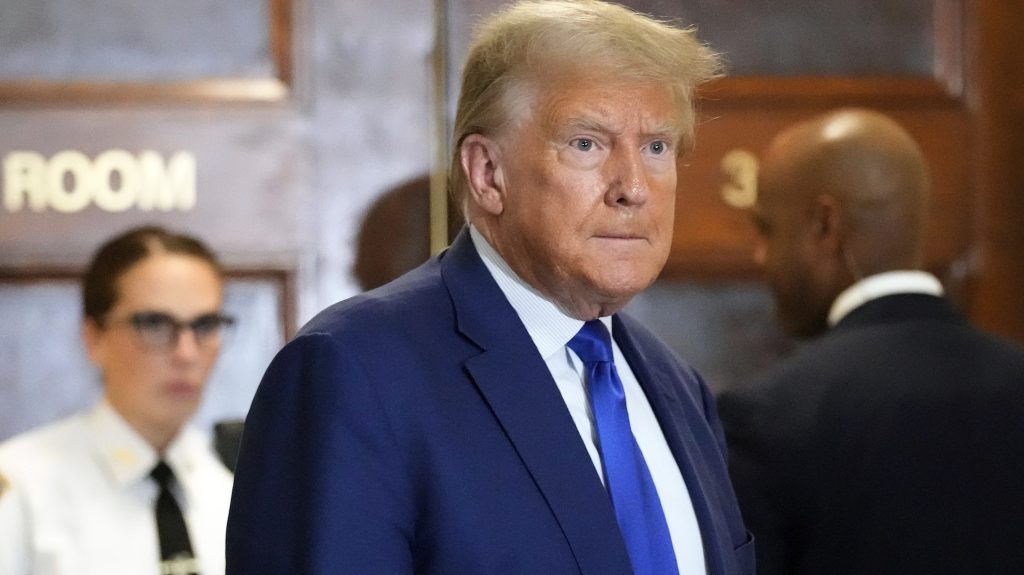 Former President Donald Trump speaks during a break in his civil business fraud trial at New York Supreme Court, (AP Photo/Seth Wenig)