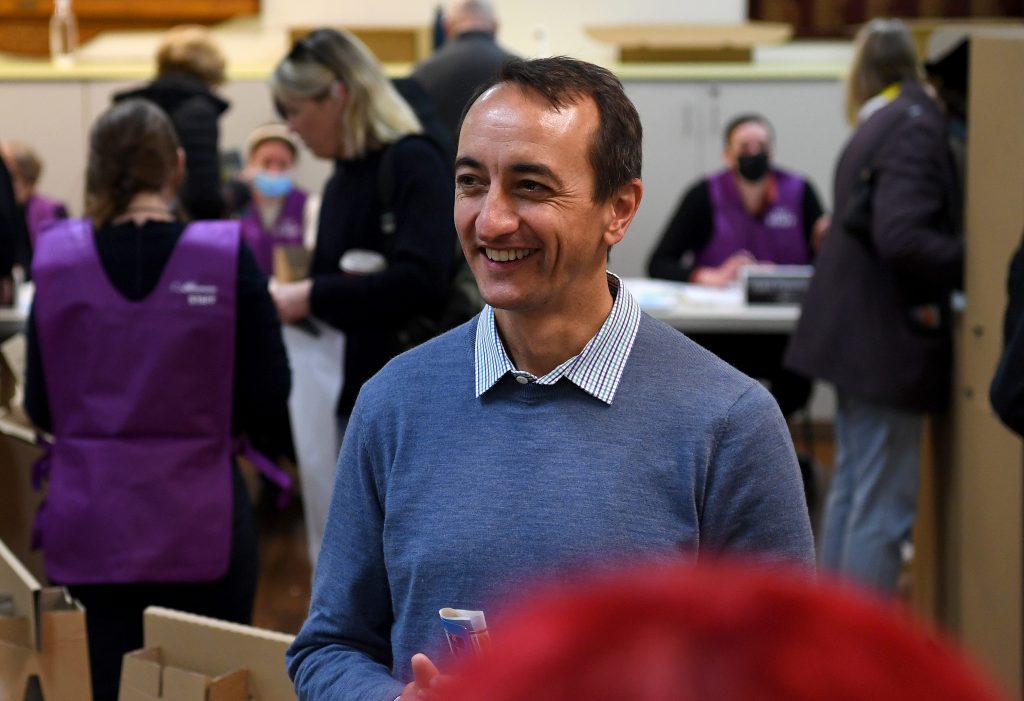 Liberal candidate for Wentworth Dave Sharma collects his ballot papers on Federal Election day, in the seat of Wentworth, Sydney, Saturday, May 21, 2022. More than 17 million Australians will vote to elect the next federal government. (AAP Image/Bianca De Marchi) NO ARCHIVING
