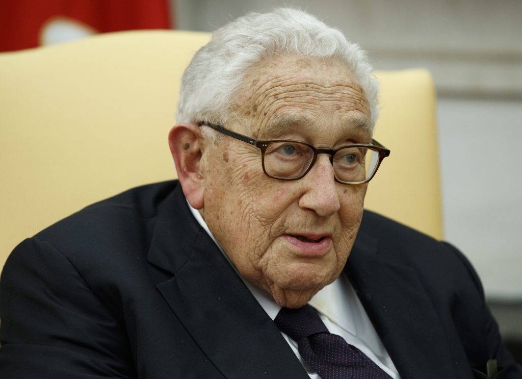 FILE - Former Secretary of State Henry Kissinger speaks during a meeting with President Donald Trump in the Oval Office of the White House, Tuesday, Oct. 10, 2017, in Washington. Kissinger marks his 100th birthday on Saturday, May 27, 2023, outlasting many of his political contemporaries who guided the United States through one of its most tumultuous periods including the presidency of Richard Nixon and the Vietnam War. (AP Photo/Evan Vucci, File)