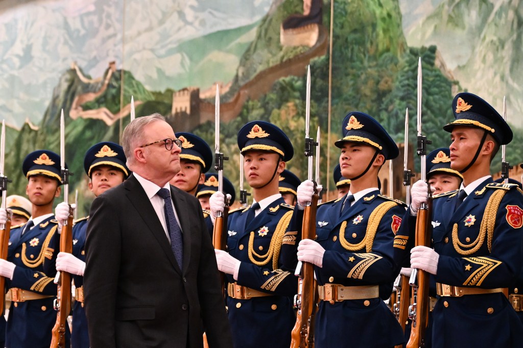 Australian Prime Minister Anthony Albanese inspects a Guard of Honour during a Ceremonial Welcome at the Great Hall of the People in Beijing, China, Tuesday, November 7, 2023. The Prime Minister’s meeting with Premier Li will conclude the first visit to the Asian nation by a sitting prime minister since 2016. (AAP Image/Lukas Coch) NO ARCHIVING