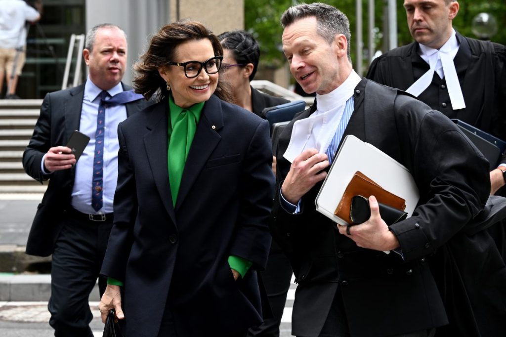 Lisa Wilkinson (left) leaves during a break in proceedings at the Federal Court of Australia in Sydney, Thursday, November 23, 2023. (AAP Image/Dan Himbrechts) 