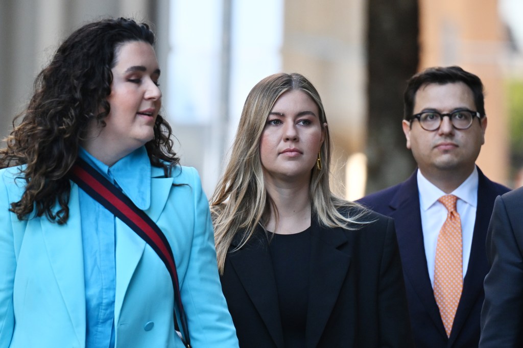 Brittany Higgins arrives at the Federal Court of Australia in Sydney, Thursday, November 30, 2023. Lehrmann is suing Network Ten and journalist Lisa Wilkinson in the Federal Court, claiming their interview with Brittany Higgins on The Project in February 2021 defamed him. (AAP Image/Dean Lewins) NO ARCHIVING