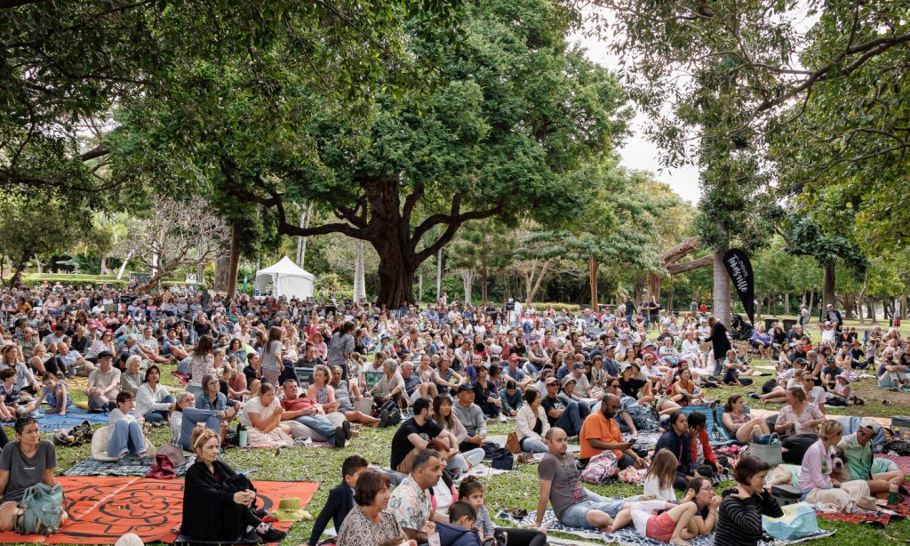 This is what cultural tourism in Queensland looks like - crowds gather in Queens Gardens Townsville during the annual Australian Festival of Chamber Music.