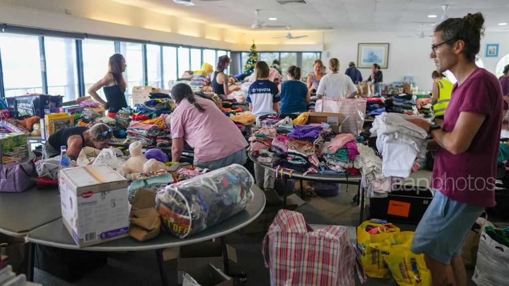 Thumbnail for Out of the frying pan: Flood victims sent to town low on water, with only three days of food