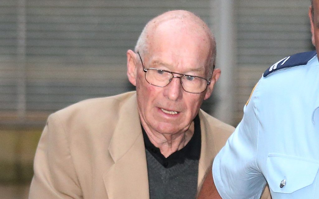 Former Detective Roger Rogerson is led to a prison van at the NSW Supreme Court in Sydney, Friday, June 3, 2016. Rogerson and Glen McNamara have both pleaded not guilty to murdering 20-year old student Jamie Gao in May 2014. (AAP Image/David Moir) 